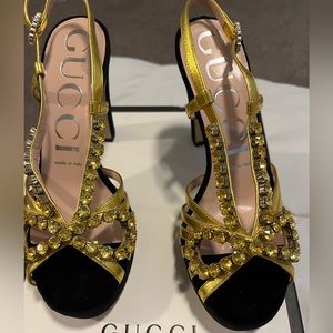 GUCCI BLACK AND GOLD HEELS